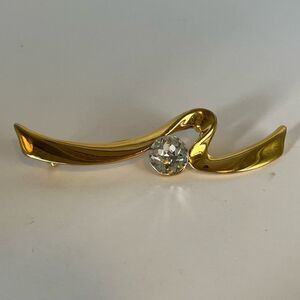 MMOO Gold tone Ribbon with CZ brooch